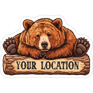 sleepy bear on log Sticker